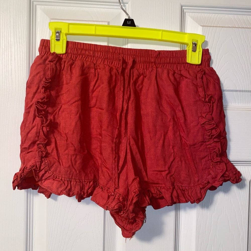 orange ruffled shorts